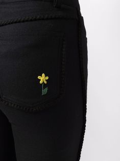 Black virgin wool high-waisted flared trousers from CORMIO featuring high-waisted, flared, floral embroidery, belt loops, front button and zip fastening and classic five pockets. | Cormio High-Waisted Flared Trousers Embroidery Belt, Flared Trousers, High Waisted Flares, Flare Trousers, Floral Embroidery, Dress Pants, Wide Leg Pants, Baseball Hats, Trousers