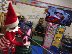 an elf is on the television in her classroom