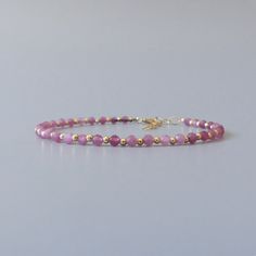 Fall in love with our dainty pink tourmaline  gemstone beaded bracelet, perfect timeless delicate minimalist design, handmade to be stacked or worn on its own. Will make a thoughtful birthday, Christmas, or anniversary gift for your wife, mother, sister, daughter, or friend. Tourmaline is October birthstone- Libra gift or 8th wedding anniversary gift.  Your purchase will arrive elegantly packed  in a gift-ready suede storage bag  and will include a complimentary cleaning cloth. Treat yourself or Pink Faceted Beaded Bracelets For Everyday, Pink Faceted Beads Jewelry For Everyday, Everyday Pink Beaded Bracelets With Faceted Beads, Everyday Pink Faceted Beads Jewelry, Everyday Pink Jewelry With Faceted Beads, Everyday Pink Bracelet With Faceted Beads, Everyday Pink Bracelets With Faceted Beads, Dainty Adjustable Single Strand Beaded Bracelets, Pink Single Strand Beaded Bracelet Gift