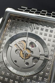 Closeup of VIEREN Steel Stereo Diamond watch dial with 93 natural diamonds, skeleton design, and reimagined date disc Rectangular Watch, Swiss Automatic Watches, Skeleton Design, Swiss Luxury, Stereo Systems, Tape Deck, Swiss Made Watches, Watch Dial, Neutral Design