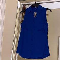 Express Royal Blue Sleeveless Top With Matching Royal Blue Buttons Casual Blue Vest For Work, Casual Blue Vest For Workwear, Blue Tank Vest Blouse, Chic Blue Tank Vest, Blue Tank Vest For Spring, Blue Sleeveless Vest For Work, Blue Vest Top For Work, Sleeveless Blue Blouse For Work, Blue Sleeveless Tank Top For Work