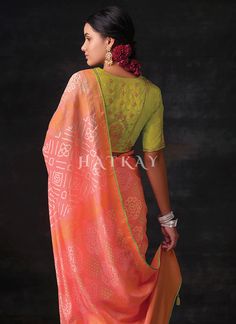 Peach And Lime Embroidered Festive Saree has classic and stylish appeal with all the hues of indian traditional touch. This saree is embedded perfectly with bandhani motifs all over pallu on pure organza silk saree with tassel detail paired with resham thread and sequence embroidered vibrant silk blouse. Drape this saree on parties and events with heels and handcrafted jewellery to look like a diva. Shop Latest Indian Saree In USA, UK, Canada, Germany, Mauritius, Singapore With Free Shipping Wor Bandhani Saree Blouse Designs Latest, Worked Blouse, Festive Saree, Organza Silk Saree, Latest Indian Saree, Designer Sarees Collection, Blouse Saree, Embroidery Saree, Up Book