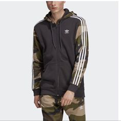 Panels Of Camouflage Print Give This Streetwear Staple An Edge. This Hoodie Is Made Of Cotton French Terry For A Soft, Comfy Feel. It Has A Slim Fit For A Modern Look. Adidas Originals Men's Camo Full Adidas Brand New With Tags Black Military Style Long Sleeve Hoodie, Camouflage Fleece Hoodie For Fall, Sporty Long Sleeve Camouflage Outerwear, Adidas Casual Hooded Jacket For Streetwear, Sporty Camouflage Hoodie With Drawstring Hood, Casual Adidas Hooded Jacket For Streetwear, Sporty Camouflage Hoodie Outerwear, Adidas Hooded Long Sleeve Jacket For Streetwear, Sporty Camouflage Sweatshirt For Streetwear