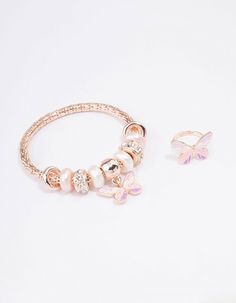 Spoil little kids and big kids at heart with our collection of kids jewellery, accessories, gift sets and more! Delight the little ones with this bracelet and ring gift set, featuring a gold stretchy butterfly charm bracelet and ring to match. | Lovisa Kids Rose Gold Stretch Glitter Butterfly Bracelet & Ring Set Dr Belongings, Lovisa Jewellery, Pandora Bracelet Charms Ideas, Kids Jewellery, Butterfly Charm Bracelet, Xmas Wishlist, Pandora Jewelry Charms, Glitter Butterfly, Bracelet And Ring