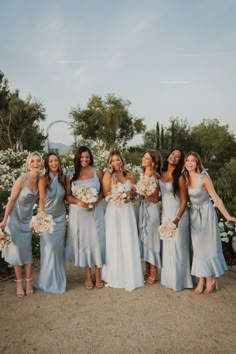 a group of women standing next to each other