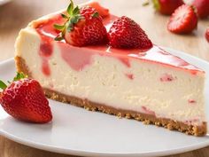 a piece of cheesecake with strawberries on top