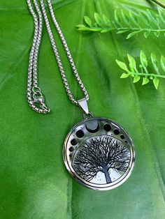 This unique piece honors the Tree of Life, a universal spiritual symbol representing growth, wisdom, protection, beauty, strength and redemption. The tree is surrounded by sacred symbolism of the moon phases, representing our natural connection to the cyclical rhythms of nature. Description: This listing is for ONE (1) Tree of Life & Moon Phases Necklace. Pendant is 1.25 inches in diameter. Made of stainless steel. Necklace comes with antique stainless steel silver chain. Please choose desired c Spiritual Necklaces, Jewelry Spiritual, The Moon Phases, Spiritual Necklace, Amethyst Crystal Necklace, Spiritual Yoga, Tree Jewelry, Yoga Necklace, Moon Phases Necklace