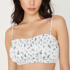 Blue And White Floral Tie Strap Bandeau Top Never Worn Perfect Condition Elastic Bands At Rope And Bottom Of Bust White Spaghetti Strap Tube Top For Spring, White Spaghetti Straps Tube Top For Spring, Spring Bandeau Tube Top With Adjustable Straps, Spring Strapless Tube Top With Adjustable Straps, Blue Spaghetti Strap Tube Top For Summer, Blue Spaghetti Straps Tube Top For Summer, Blue Adjustable Straps Crop Top For Spring, Spring Blue Crop Top With Adjustable Straps, Blue Crop Top With Adjustable Straps For Spring