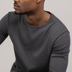 The Modern LS is a must-have long-sleeve tee version of our best-selling Modern Crew, but with added tailored full-length sleeves. Featuring a curved bottom hem, a binded collar, and a more tailored fit throughout the chest and sleeves. Classic Long Sleeve T-shirt For Work, Relaxed Fit Long Sleeve Work T-shirt, Classic Long Sleeve T-shirt For Spring, Relaxed Fit Long Sleeve T-shirt For Work, Workwear Tops With Long Sleeves And Ribbed Cuffs, Modern Long Sleeve Sweatshirt For Everyday, Long Sleeve Tops With Ribbed Cuffs For Work, Gray Fitted Long Sleeve Sweatshirt, Modern Long Sleeve Cotton T-shirt