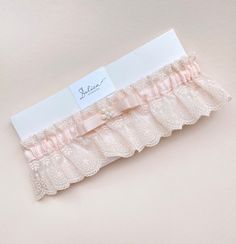 Blush Bridal Garter with Lace and Pearls for your best day! Both elegance and tradition on your wedding day with this beautiful blush bridal garter. This bridal garter is made from delicate lace and decorated with a satin ribbon and pearl accents, this garter is the perfect blend of bauty and romance. This blush bridal garter is designed to make you feel special on your big day. The soft lace and pearl accents add a touch of vintage charm, while the blush color offers a modern twist. Features: C Pink Garter, Bridal Garter Lace, Leg Garter, Wedding Garters, Blush Bridal, Rose Pale, Bridal Garter, Wedding Garter, Feel Special