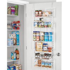 the pantry door is open to reveal an assortment of food items in its storage compartment