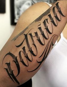 a woman with a tattoo on her arm that says,'sister'in cursive writing