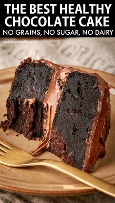 a piece of chocolate cake on a plate with a fork