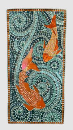 a mosaic tile with two fish swimming in the water