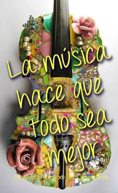 a guitar with the words la musica vace ave toad sea mejo on it