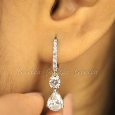 3 CT Pear & Round Cut Lab Grown Diamond Drop Dangle Earrings, Lab Grown IGI Certified Lever Back Drop Diamond Earrings, Anniversary Earrings, Gold And Diamond Handmade Jewelry, 10/14K Solid White Gold Earrings, Gemstone Earrings ➡ Lab Grown Diamond is also known as 𝐂𝐕𝐃, 𝐇𝐏𝐇𝐓, 𝐆𝐫𝐞𝐞𝐧 𝐃𝐢𝐚𝐦𝐨𝐧𝐝, 𝐄𝐭𝐡𝐢𝐜𝐚𝐥 𝐝𝐢𝐚𝐦𝐨𝐧𝐝, 𝐄𝐜𝐨-𝐅𝐫𝐢𝐞𝐧𝐝𝐥𝐲 𝐃𝐢𝐚𝐦𝐨𝐧𝐝, 𝐄𝐚𝐫𝐭𝐡 𝐅𝐫𝐢𝐞𝐧𝐝𝐥𝐲 𝐃𝐢𝐚𝐦𝐨𝐧𝐝. 🤎 𝗗𝗲𝘀𝗰𝗿𝗶𝗽𝘁𝗶𝗼𝗻 𝐎𝐟 𝐑𝐢𝐧𝐠 🤎 ✤ All 𝐃𝐢𝐚𝐦𝐨𝐧𝐝 𝐃𝐞𝐭𝐚𝐢𝐥𝐬: (𝐈𝐆𝐈 𝐂𝐞𝐫𝐭𝐢𝐟𝐢𝐞𝐝) ➡ Diamond Type: Lab Grown Diamond (CVD/HPHT) ➡ Shape: Pear And Round Cut ➡ Color: G ➡ Clarity: VS1 ➡ Carat Weight: 3.00 CT(approx.) ✤ 𝗠𝗲𝘁𝗮𝗹 𝗗𝗲𝘁𝗮𝗶𝗹𝘀: ➡ 10K White Gold ➡ 14K White Gold ➡ 18K White Gold ✤ 𝐌𝐚𝐤𝐢𝐧𝐠 𝐏𝐫𝐨𝐜𝐞𝐬𝐬: 𝐇𝐚𝐧𝐝𝐦𝐚𝐝𝐞 - 𝐂𝐫 Classic Drop Hoop Earrings For Weddings, Anniversary Dangle Teardrop Earrings With Prong Setting, Anniversary Dangle Teardrop Earrings, Anniversary Teardrop Linear Earrings, Pierced Teardrop Linear Earrings For Anniversary, Teardrop Jewelry With Bail For Wedding, Teardrop Dangle Earrings For Anniversary, Green Diamond, White Gold Earrings