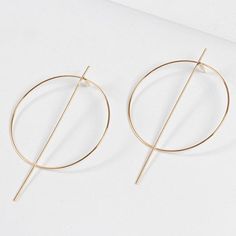 Delicate hoop earrings with line design. - 14k gold dipped - Closure: Post Back - Length: 3.5" - Width: 2.75" - Nickel and Lead Compliant (Hypoallergenic) - Style #919202 Metal Hoop Linear Earrings For Pierced Ears, Minimalist Metal Hoop Wrap Earrings, Gold Dipped, Line Design, Gold Earrings, Gold Bracelet, Hoop Earrings, Gold, Quick Saves