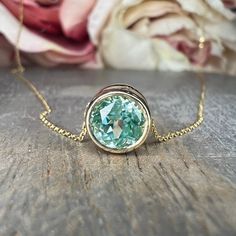 Paraiba Tourmaline Bezel Pendant Round Green Necklace - Etsy Cabachon Bezel Necklace, Yellow Gold Round Green Amethyst Jewelry, Pendant Delicate, Pink Sapphire Pendant, Faberge Jewelry, Floating Necklace, Paraiba Tourmaline, Green Mint, Tourmaline Necklace