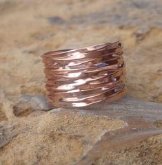 This gorgeous, wide ring makes quite the statement! It looks as though you're wearing a set of stackable, rose gold rings but this is one band, about 14mm in width. It is 14k rose gold plated and a load of texture with the multiple joining, twisted eternity bands. Beautiful and makes a great gift for any woman on your list. Order up one size due to the wide width of this ring. Additional photos may show other rose gold rings also available in our shop here:https://www.etsy.com/shop/EllaJoli?ref= Traditional Wedding Bands, Band Christmas, Rings Boho, Non Traditional Wedding, Pandora Gold, Mens Cross Necklace, Stacked Wedding Rings, Gold Heart Ring, Diamond Stacking Rings