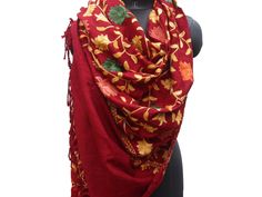 Pattern - red Kashmiri shawl with floral embroidery. Ideal for - women. Occasion - formal or casual. Fabric - cotts wool, it is a blend of cotton and wool which is very soft and has a fine texture. Color - maroon. On maroon background, embroidery is in different colored threads all over displaying floral patterns. Size - Width - 41 x 80 inches approx. Care- gentle hand wash. For more such scarves please visit- https://www.etsy.com/in-en/shop/vibrantscarves?ref=seller-platform-mcnav&section_i Winter Festive Dupatta With Motifs, Winter Embroidered Shawl With Traditional Drape, Traditional Fall Shawl Dupatta, Embroidered Dupatta For Fall, Traditional Drape Shawl For Winter, Red Pashmina Shawl With Motifs And Traditional Drape, Red Pashmina Shawl For Wedding, Traditional Wedding Scarves For Winter, Red Wedding Scarves For Festive Season