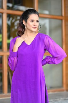 PRODUCT DESCRIPTION:-Let your personal style speak about your personality ,As you look absolutely gorgeous in our Purple Chiffone Co-Ord set.Kurta Fabric :- ChiffonPant Fabric :- ChiffonColor:-PurpleCare Instructions :- Dry clean onlyModel Size :- Model is wearing XS sizeModel Height :- 5.5''DISCLAIMER :- Slight color variations may occur due to different screen resolution. Chic Chiffon Long Sleeve Sets, Chic Long Sleeve Chiffon Set, Trendy Formal Sets With Long Sleeves, Elegant Purple Georgette Blouse, Elegant Purple Chiffon Blouse, Elegant Purple V-neck Sets, Long Sleeve Georgette Tops For Party, Long Sleeve Georgette Party Tops, Chiffon Pants