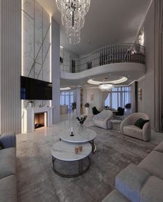 a living room filled with lots of furniture and a chandelier hanging from the ceiling