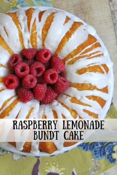 raspberry lemonade bundt cake with white icing and fresh raspberries on top