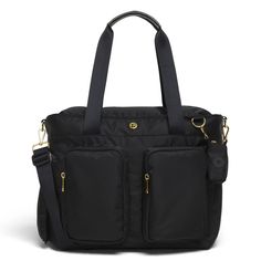 a black handbag with two zippers on the front and side pockets, one is open