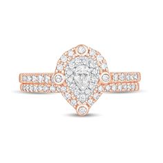 a pear shaped diamond ring set in rose gold