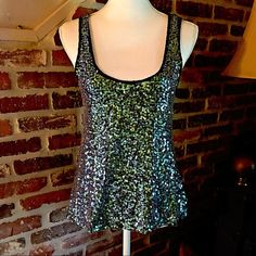 This Is A Greenish Bluish Sequined Top Size It Says Large But It Would Fit A Medium And It Is Unbranded,Mint Condition,New Green Tank Top For Night Out, Green Sleeveless Sequin Top, Casual Stretch Sequin Tank Top, Green Stretch Sequined Tops, Green Sequined Stretch Tops, Stretch Sequined Tank Top, Sequined Top, Top Tank, Sequin Top