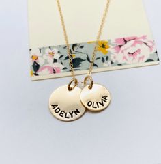 "Kids Names Necklace, Gold Disc Mom Necklace Please make sure you don't forget to put the information for personalization in the note to seller box at check out :) This is a hand stamped 14k Gold Filled necklace. This necklace comes with a 1/2 14k gold filled disc and a larger 5/8\" 14k gold filled disc. Chain is a 16, 18 or 20\" 14k gold filled cable chain. Please provide the following at checkout in message to seller box: - 1/2\" disc ( up to 9 characters) - 5/8\" disc ( up to 14 characters) E Gold Adjustable Round Disc Charm Necklaces, Stamped Gold Charm Necklaces In Sterling Silver, Gold Stamped Sterling Silver Charm Necklaces, Gold Sterling Silver Stamped Charm Necklaces, Everyday Gold Charm Necklace With Round Disc, Everyday Gold Round Disc Charm Necklace, Gold Round Disc Charm Necklace 14k Gold Filled, Gold Round Disc Charm Necklace In 14k Gold Filled, Gold Round Disc Charm Necklace