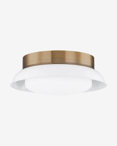 a white and gold ceiling light against a white background with no one in it's place