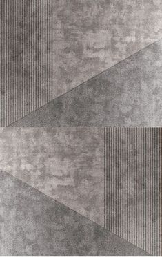 an abstract rug with grey and white stripes on it's edges, in the shape of rectangles