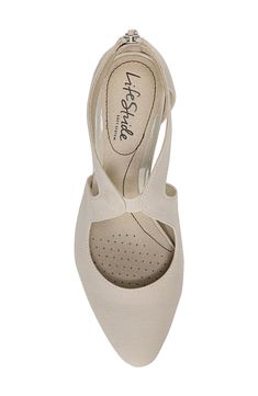 Set on a walkable heel, this almond-toe pump is fashioned with cutout details and a cushioned footbed for desk-to-dinner comfort. 2 1/2" heel Textile upper/synthetic lining and sole Imported Spring Slingback Pumps With Arch Support, Cushioned Slingback Pumps For Formal Occasions, Wide Fit Heels With Removable Insole, Wide Fit Heels With Removable Insole And Closed Toe, Wide Fit Heels With Closed Toe And Removable Insole, Beige Low Heel Court Shoes With Branded Insole, Beige Heels With Removable Insole, Spring Slip-on Court Shoes With 4-inch Heel, Cream Slingback Pumps With Removable Insole