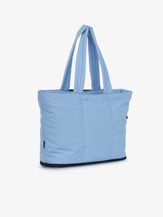 CALPAK Luka expandable laptop tote in winter sky; ALT2201-WINTER-SKY Rectangular Nylon Diaper Bag For On-the-go, Functional Tote Shoulder Bag For Overnight Trips, Casual Shoulder Bag With Zipper For Overnight Trips, On-the-go Nylon Diaper Bag With Removable Pouch, Nylon Tote Shoulder Bag For Overnight Trips, Versatile Nylon Bag For Overnight Trips, Versatile Tote Shoulder Bag For Overnight Trips, Functional Blue Shoulder Bag For Overnight Trips, Functional Nylon Shoulder Weekender Bag