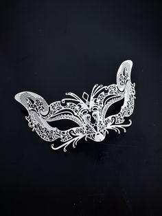 Crafted with intricate detail, this women's white masquerade mask embodies the grace and allure of the fox, making you a captivating presence at any masquerade event. Rhinestones adorn the mask, reflecting the light and adding a touch of elegance to your appearance. From grand masquerade balls to themed celebrations and elegant gatherings, our mask is the perfect addition to any look!


Age Group/Gender - Adult/Women's

Size/Type - One size fits all adults

Mask Color - White

Mask Material - Me White Masks Masquerade, White Masks And Prosthetics For Mardi Gras Gift, Elegant White Party Masks And Prosthetics, White Mardi Gras Masks And Prosthetics For Gift, Elegant White Masquerade Mask For Mardi Gras, White Mardi Gras Masks And Prosthetics, White Fantasy Eye Mask, White Masquerade Mask For Mardi Gras Gift, White Masquerade Mask For Mardi Gras