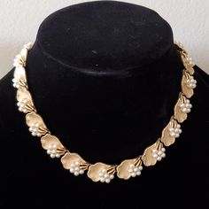 Trifari Brand Have Been Sought After By Jewelry Enthusiasts And Collectors Alike. This Is A Rare Trifari Elegant Vintage Necklace. Gold-Tone Patented Trifanium Leaf Links With Faux Pearl Clusters. Circa 1950's Trifari Jewelry, Pearl Cluster, Necklace Gold, Vintage 1950s, Vintage Necklace, Womens Jewelry Necklace, Faux Pearl, Gold Tones, Gold Necklace