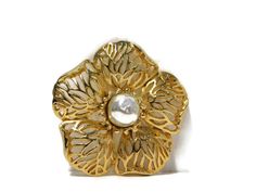 Gold Tone Reticulated Petals Flower Brooch with Faux Baroque Pearl Brooch.Mid centuryMarked A1466It is 2- 1/4" across.No damage.Excellent condition. Gold Brooch Jewelry For Spring, Elegant Gold Brooches For Spring, Gold Brooches For Spring Gift, Spring Gold Jewelry Brooch, Spring Gold Brooch Jewelry, Spring Season Gold Brooch Jewelry, Antique Gold Flower Brooch, Baroque Yellow Gold Brooch, Vintage Gold Flower Brooches