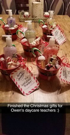 christmas gifts for children's daycare teachers on a table with candy canes