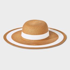 Update your summer accessories with this Striped Straw Floppy Hat from Shade & Shore™. This woven floppy hat features a striped pattern for a chic, contrasting look. Made of midweight paper straw material, it provides a comfortable fit for all-day wear, and the pull-on style makes it easy to put on or take off. Plus, the 4.75-inch brim keeps your face shaded from the sun's rays. Shade & Shore™: Found exclusively at Target. White Straw Hat With Curved Brim For Sunbathing, White Brimmed Sun Hat For Pool, Chic White Sun Hat For Vacation, White Straw Hat For Pool, White Sun Hat For Spring Picnic, White Curved Brim Hat For Pool, White Curved Brim Hat For Picnic, Casual White Straw Hat For Pool, White Wide Brim Hat For Picnic