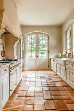 37 French Country Kitchen Ideas for Cozy and Functional Designs French Country Kitchen Floors, French Country Floors, Small French Cottage, Stone Floor Kitchen, French Style Kitchen Ideas, Lakehouse Kitchen Ideas, French Country Kitchen Backsplash, French Flooring, French Country Flooring