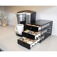 a coffee maker sitting on top of a counter