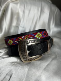 Leather Beaded Belt with vibrant beads .  Size L  Waist - 33 inches  Stamped silver buckle signs of wear on the leather where the adjustable holes are Western Beaded Belts, Leather Beaded Belt, Beaded Leather Belts Native American, Handmade Multicolor Bohemian Belt, Black Leather Embroidered Belt Buckles, Apache Junction, Beaded Belt, Boho Leather, Belt Black