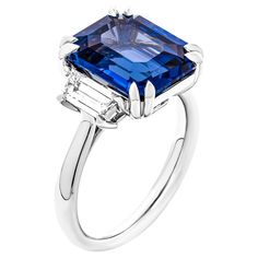 3 stone ring in Platinum Center stone: 7.97ct Blue Emerald cut Sapphire Certified: CDC2201543 Country of origin: Sri Lanka Side stones: 0.66ct F VVS trapezoids Size: 6.5 Luxury Emerald Cut Sapphire Ring With Center Stone, Luxury Sapphire Ring With Three Stone Baguette Cut, Luxury Three Stone Sapphire Ring With Baguette Cut, Luxury Three-stone Sapphire Ring With Baguette Cut, Formal Three Stone Sapphire Ring With Baguette Cut, Three Stone Baguette Cut Sapphire Ring For Formal Occasions, Formal Three-stone Sapphire Ring With Baguette Cut, Luxury Three Stone Emerald Cut Sapphire Ring, Luxury Three-stone Emerald-cut Sapphire Ring