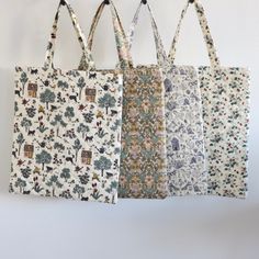 We are in love with these grandma-chic Prairie Quilted Cotton Printed Totes! Each features a pretty design reminiscent of old school fabric patterns but with a modern feel. With one large compartment plus an interior pocket, it's perfect for carrying your daily essentials! Prairie printer tote Made of 100% quilted cotton Choose from four patterns Large main compartment with an interior pocket Spot clean Each measures 15"L x 17"H Imported Cottagecore Wardrobe, Grandma Chic, Quilted Purse, Quilted Tote Bags, Quilted Purses, Quilted Totes, Creative Co Op, Bags Aesthetic, Pretty Design