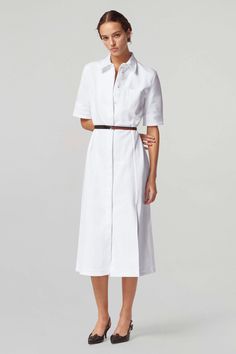 The 'Kieran' Dress in white denim is cut to a classic A-line silhouette with a small point collar and short sleeves. It's detailed with a slim leather waist belt. Leather Waist Belt, Brand Collection, Knitwear Tops, Favorite Dress, White Denim, Waist Belt, Get The Look, Evening Wear, Jacket Tops