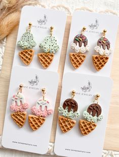 four pairs of ice cream and donut earrings on top of a white card board