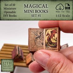 the miniature book is being held up by someone's hand and it looks like they are