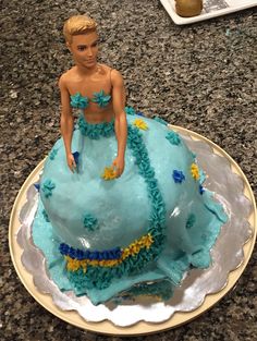 there is a cake that looks like a barbie doll