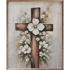 a cross with white flowers painted on it